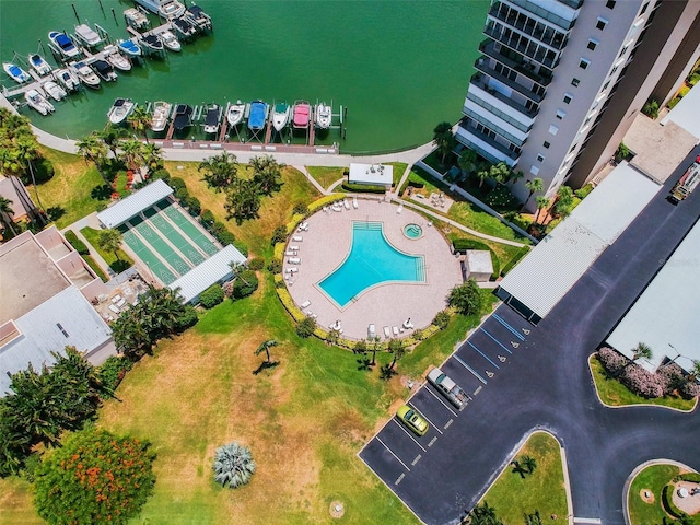 birds eye view of property with a water view