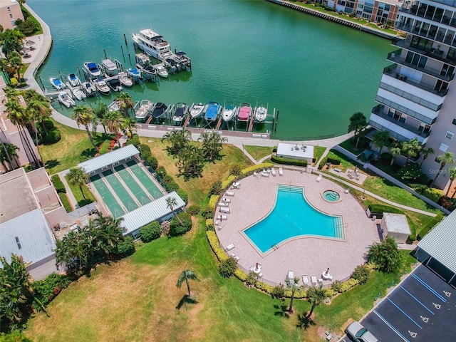 birds eye view of property with a water view