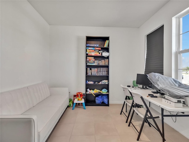 office space with light tile patterned floors