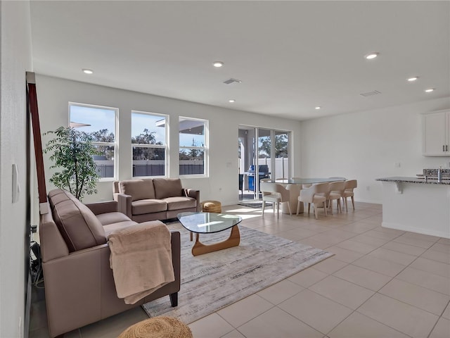 living room featuring light tile patterned flooring