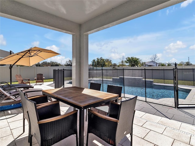 view of patio / terrace featuring a fenced in pool