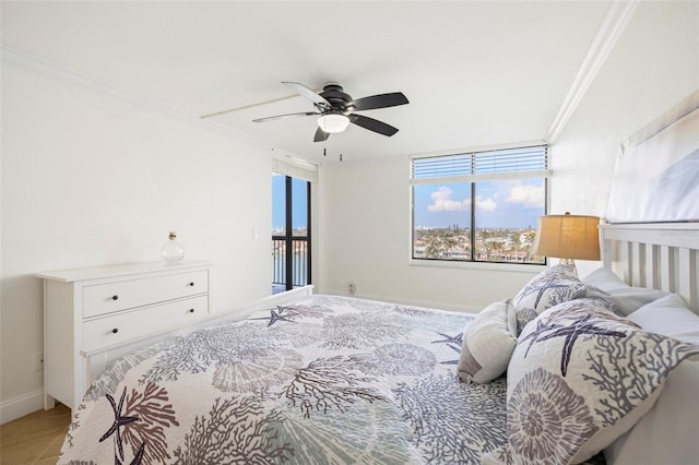 bedroom with ornamental molding, light tile patterned floors, access to exterior, and ceiling fan