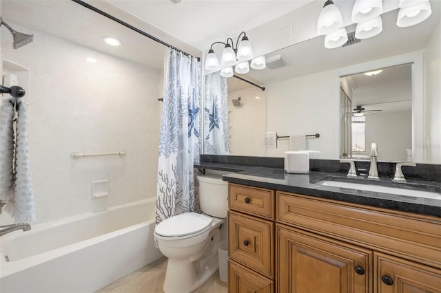 full bathroom with ceiling fan, vanity, toilet, and shower / tub combo