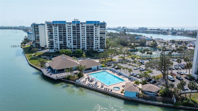 birds eye view of property with a water view