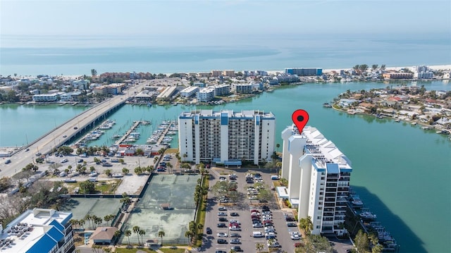 birds eye view of property with a water view