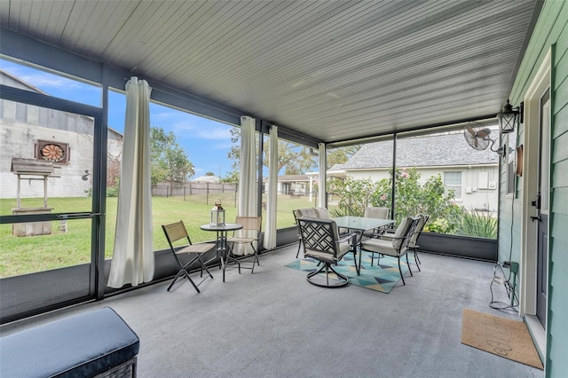 sunroom featuring a healthy amount of sunlight