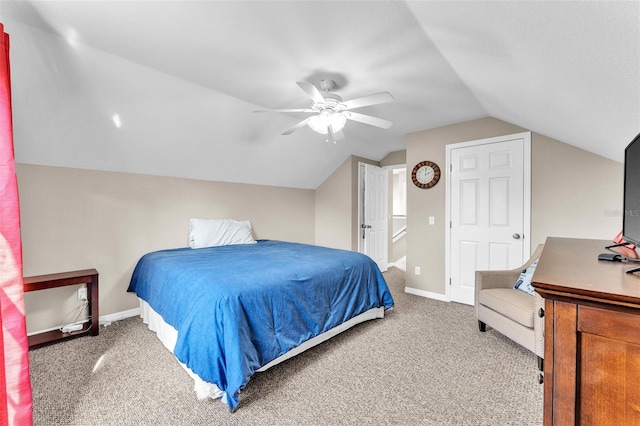 carpeted bedroom featuring lofted ceiling and ceiling fan