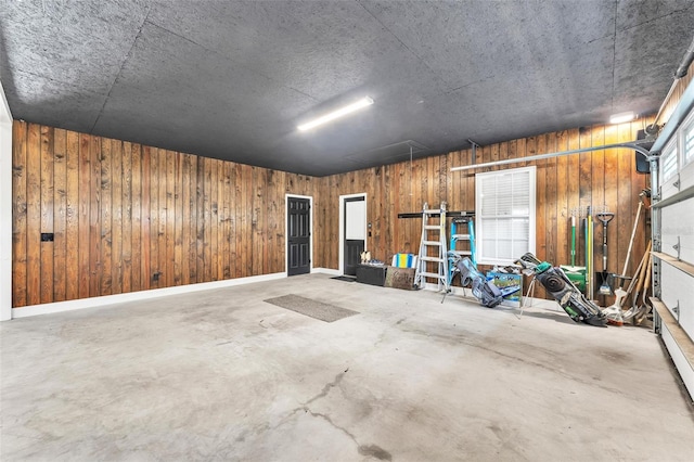 garage with wood walls