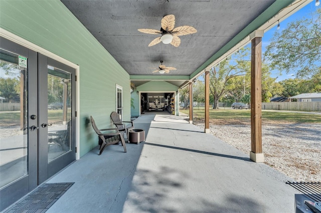 view of patio featuring ceiling fan