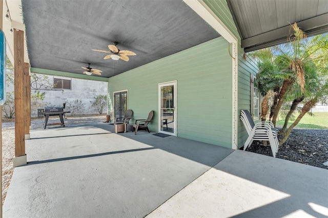 view of patio / terrace featuring ceiling fan