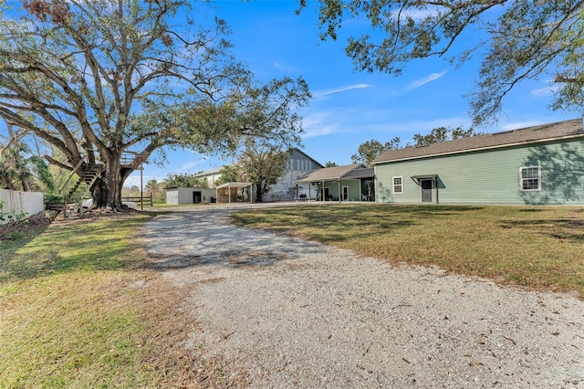 exterior space featuring a front lawn