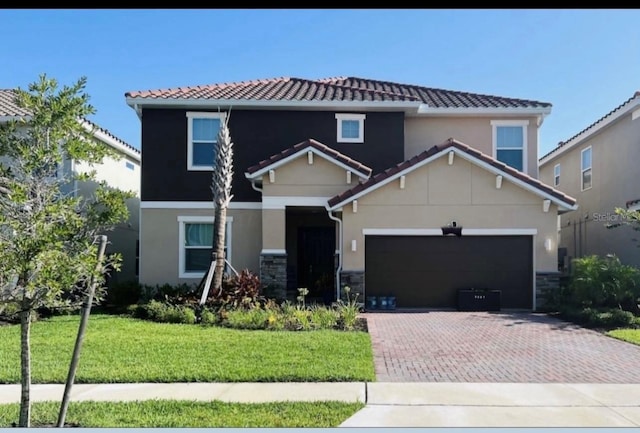 view of front of property with a front lawn