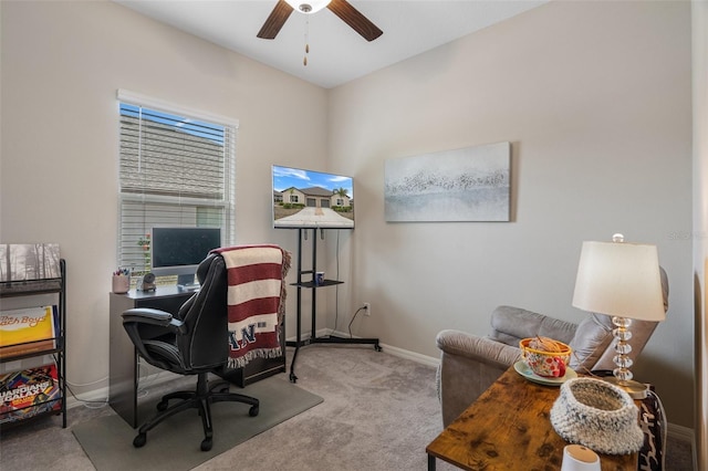 home office with ceiling fan and light colored carpet