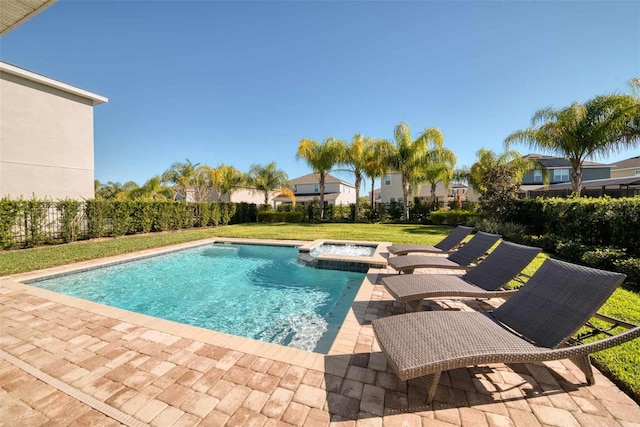 view of pool with a lawn