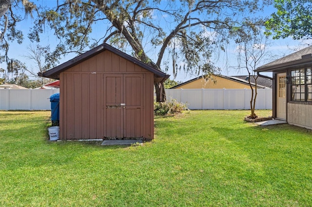 view of outdoor structure featuring a yard