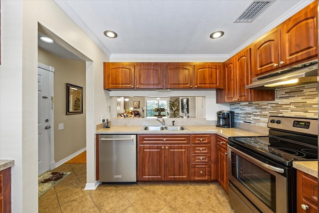 kitchen featuring tasteful backsplash, sink, light tile patterned floors, stainless steel appliances, and crown molding