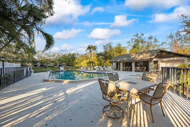 view of pool featuring a patio