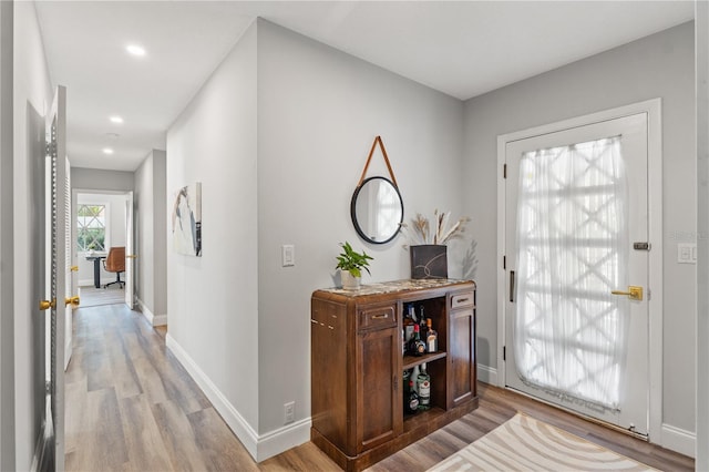 foyer entrance featuring light hardwood / wood-style flooring