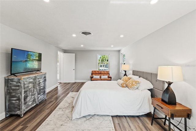 bedroom featuring dark wood-type flooring