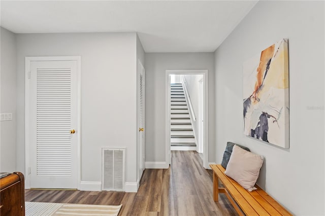 hall featuring dark wood-type flooring