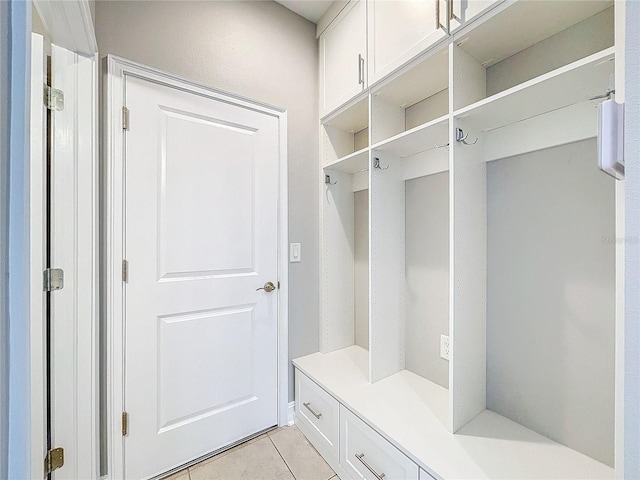 mudroom with light tile patterned flooring