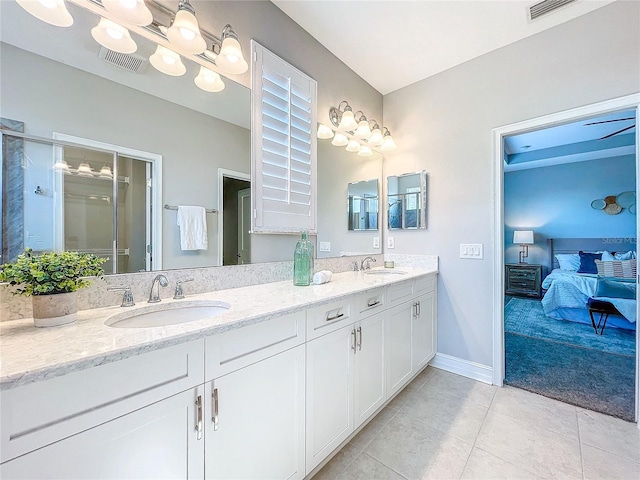 bathroom featuring vanity and tile patterned floors