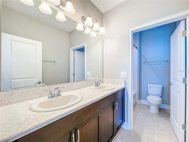 full bathroom with tile patterned flooring, vanity, shower / bathing tub combination, and toilet