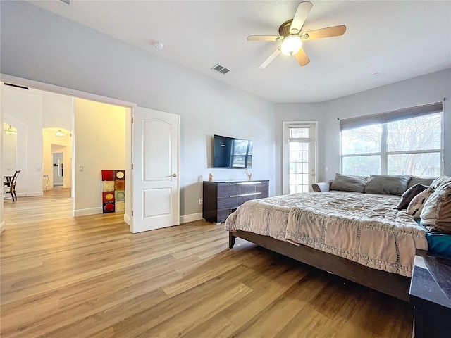 bedroom featuring light hardwood / wood-style flooring and ceiling fan