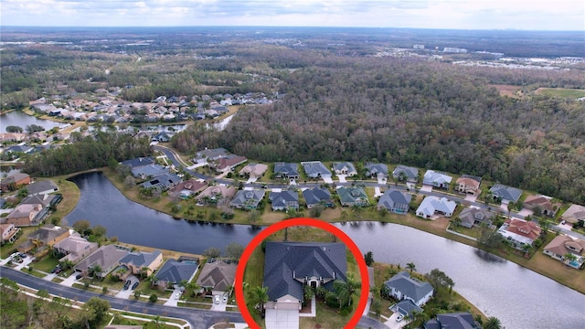 aerial view with a residential view and a water view