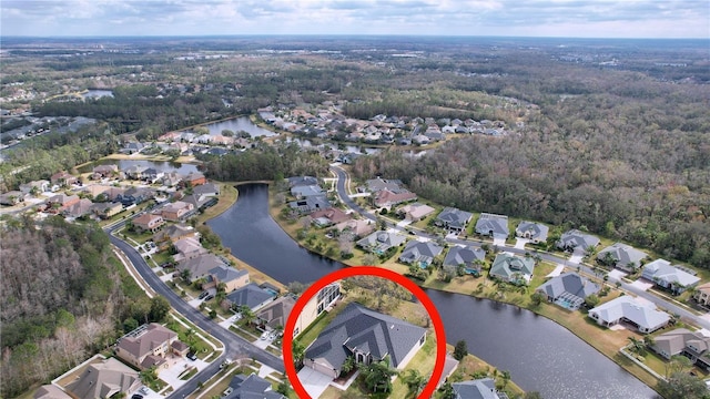 bird's eye view with a water view and a residential view