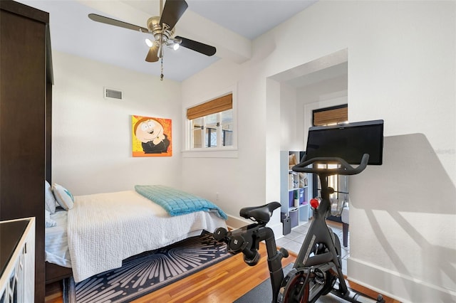 bedroom with ceiling fan and light hardwood / wood-style floors