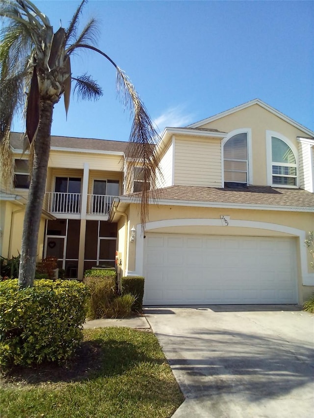 view of front of property with a garage