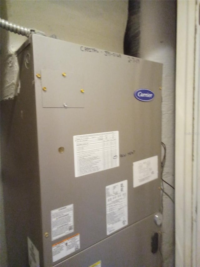 utility room with heating unit