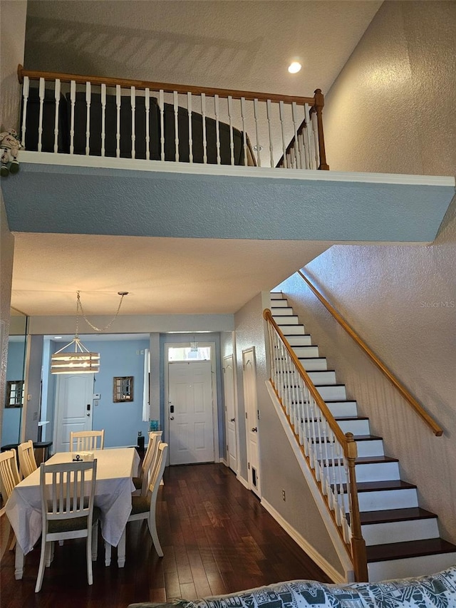 foyer with dark hardwood / wood-style floors