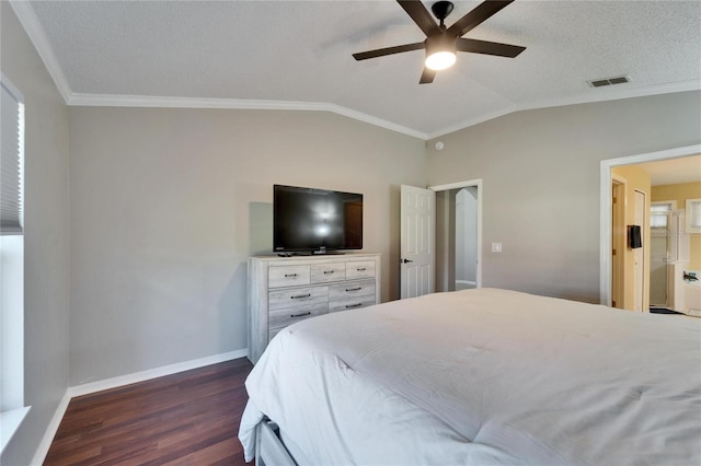 bedroom with lofted ceiling, dark hardwood / wood-style flooring, ornamental molding, ceiling fan, and a textured ceiling