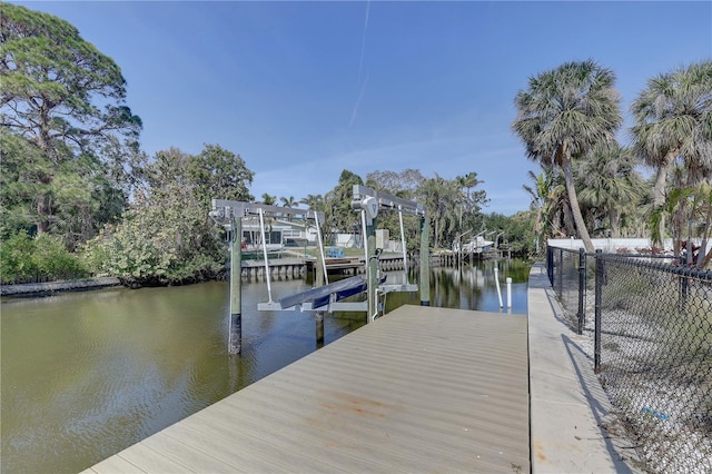 dock area featuring a water view