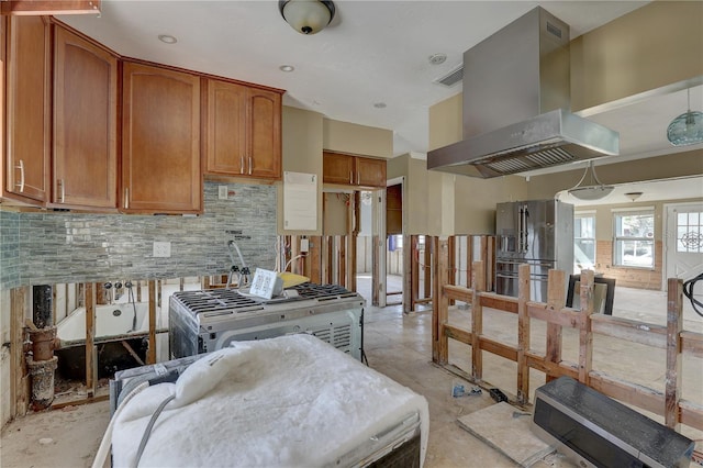 kitchen with island range hood, high end refrigerator, and decorative backsplash