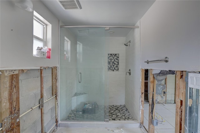 bathroom with an enclosed shower