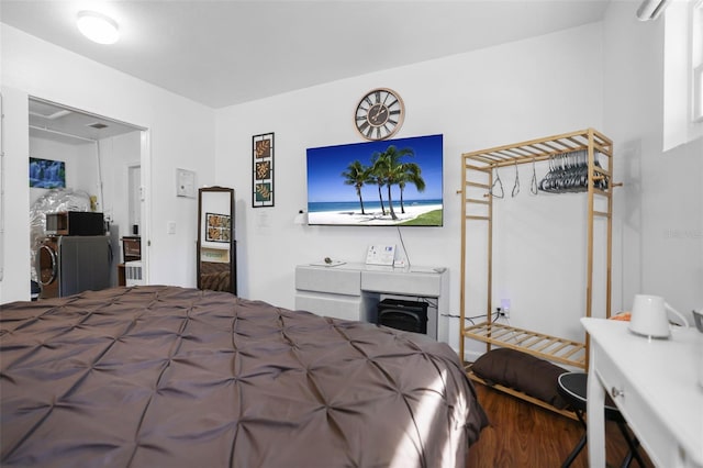 bedroom with wood finished floors