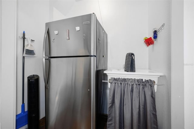 kitchen with freestanding refrigerator