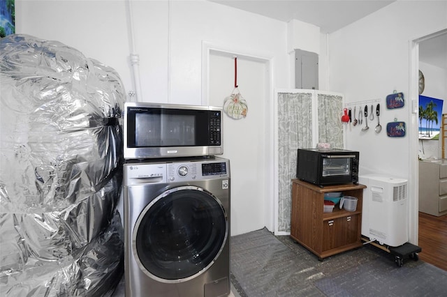 3087 Duane Ave, Oldsmar, FL 34677 - clothes washing area featuring laundry area, wood finished floors, a toaster, and washer / dryer
