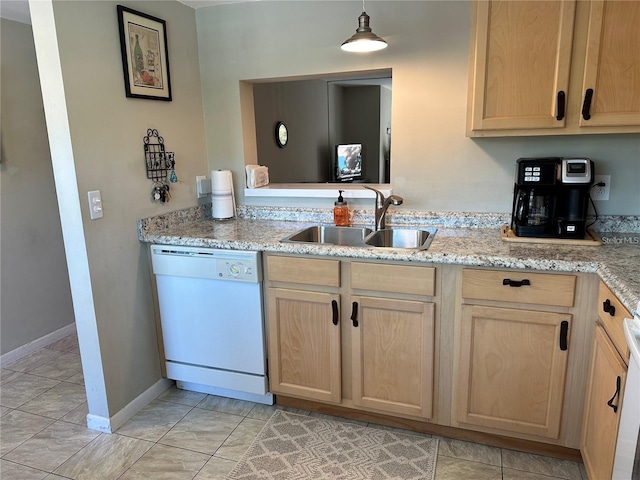 kitchen with sink, dishwasher, light stone countertops, light brown cabinetry, and decorative light fixtures