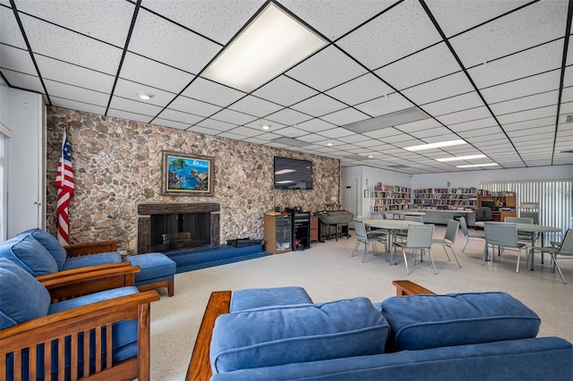 living room featuring a paneled ceiling