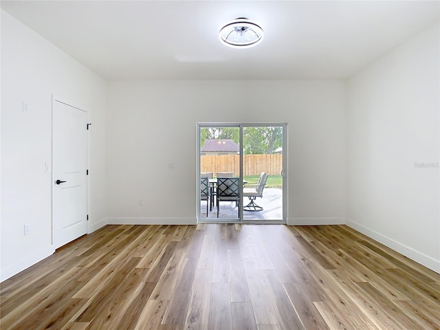 empty room featuring light hardwood / wood-style floors