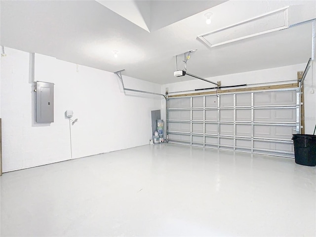 garage with a garage door opener, electric panel, and water heater