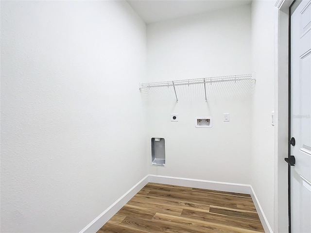 laundry area featuring washer hookup, wood-type flooring, and electric dryer hookup