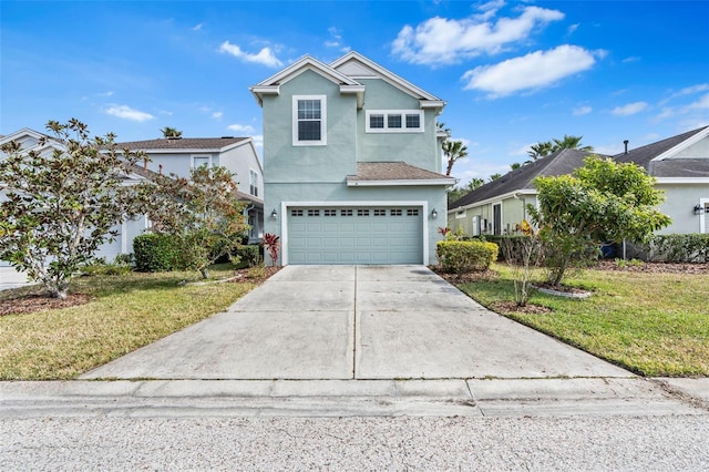 front of property featuring a garage and a front yard