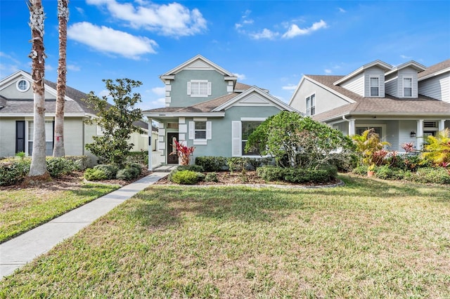 view of front facade featuring a front yard