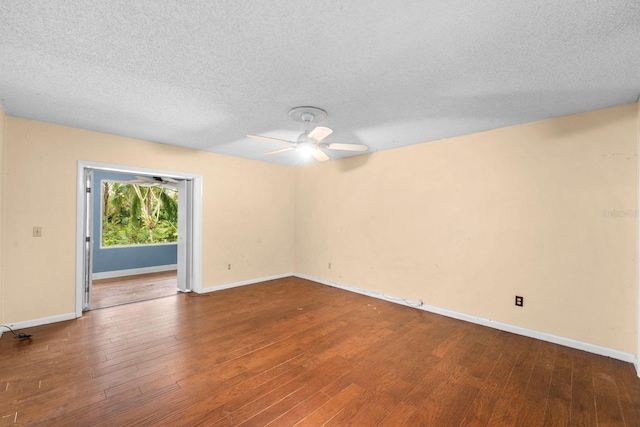 unfurnished room with wood-type flooring, ceiling fan, and a textured ceiling