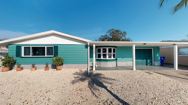 exterior space featuring a carport